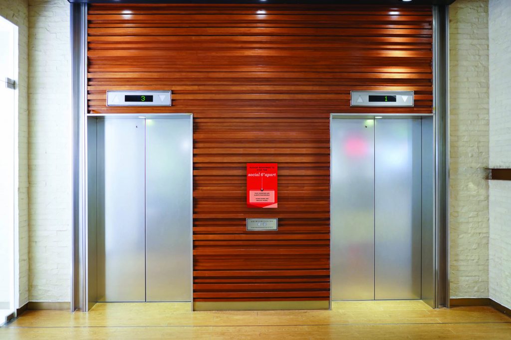 Hotel Safety Signage near the elevators of the hotel.